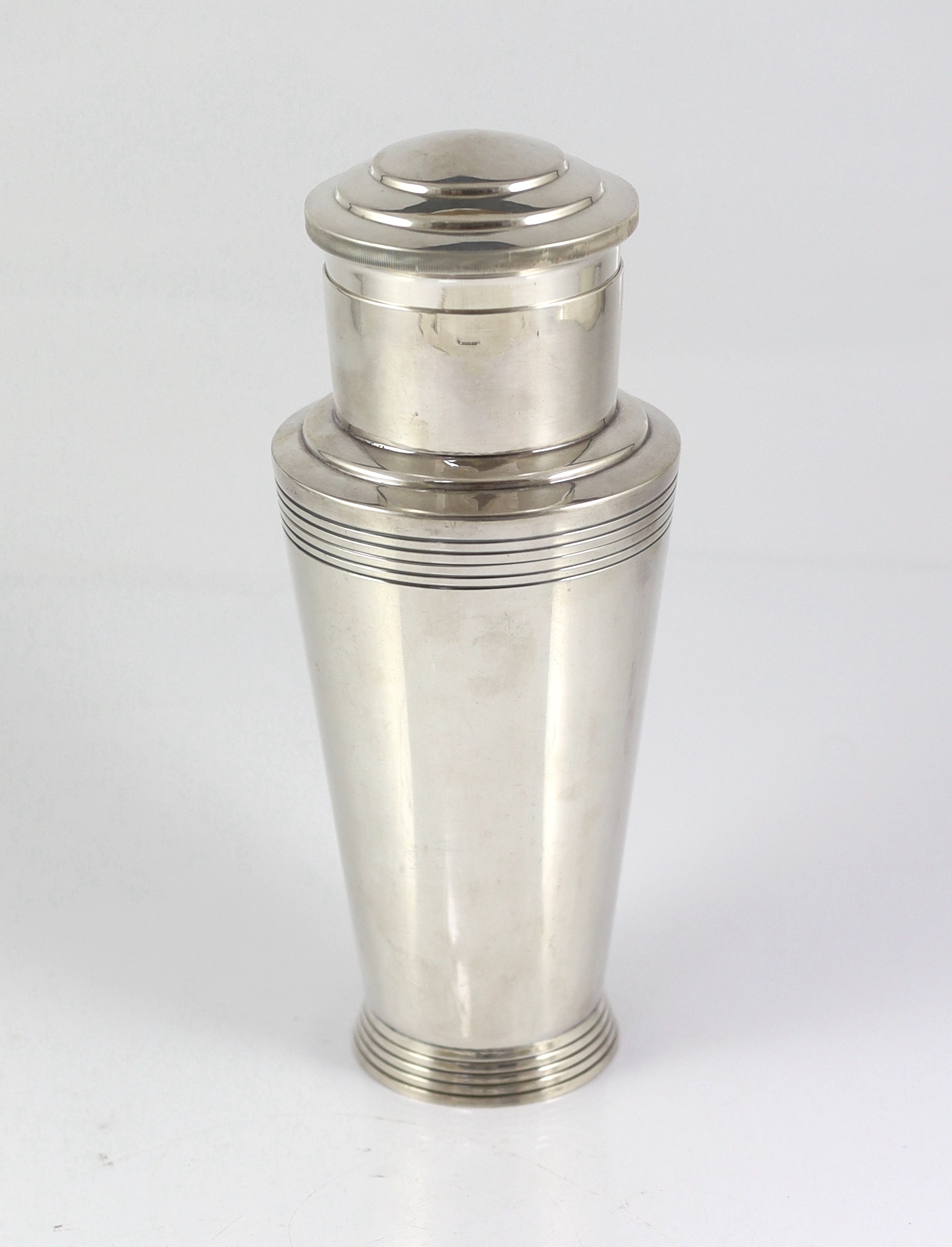 A 1930's Art Deco Mappin & Webb silver plated cocktail shaker designed by Keith Murray, numbered W28721